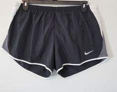 Item Name: Nike Dri-Fit Shorts Womens XL 2XL Black White Running Training 849394-010 Description:  These Nike Dri-Fit Shorts are perfect for any active woman. They are made of high-quality polyester material that is breathable and comfortable, making them ideal for gym training, running, or jogging. The shorts feature an elastic waistband with drawstring closure, ensuring a secure and comfortable fit. The black color and regular fit make them a classic addition to any activewear wardrobe. They are machine washable for easy care, and have no personalization features. These shorts are a must-have for any woman who wants comfortable and stylish activewear. Condition: New with tags.  Shipping: Item(s) will ship same day item is ordered and paid for, provided that the item(s) is ordered an hour Cheap Nike Black Athletic Shorts, Stylish Activewear, Training Running, Nike Dri Fit Shorts, Shorts Womens, Active Wear Shorts, Gym Training, Running Training, Active Women