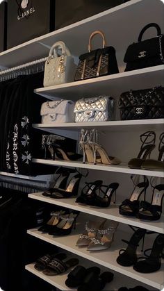 a closet filled with lots of shoes and handbags