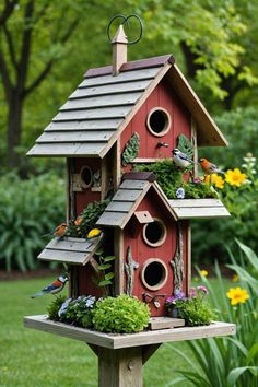 a bird house with plants growing out of it