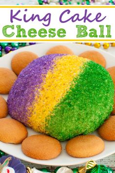 cheese ball covered in purple, yellow and green sugar on white plate with vanilla wafers King Cake Dip, Mardi Gras Food Appetizers Easy, Mardi Gras Appetizers Easy, Mardi Gras Potluck Ideas, Mardi Gras Snacks Appetizers, Mardi Gras Food Appetizers, Mardi Gras Dip, Mardi Gras Food Ideas, Mardi Gras Treats