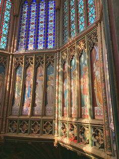 the interior of a church with stained glass windows