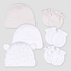 Our pack of 3 baby caps and 3 sets of mittens are the perfect way to keep your little one cozy and safe. Made from 100% cotton, each piece is soft and gentle on sensitive baby skin. The elastic wristbands on the mittens offer a secure and comfy fit, keeping tiny hands cozy and protected against accidental scratches. Matching baby caps provide extra warmth and help regulate your little one's temperature to keep them cozy on cooler days. With neutral colors that effortlessly match any outfit, this Girl Beanie, Tiny Hands, Baby Mittens, Gerber Baby, Third Baby, Matching Baby, Baby Cap, 3rd Baby, Tiny Hand