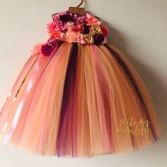 This stylish tee-length tutu dress and matching headband are perfect for dress-up, birthday parties, and weddings. The dress comes with a matching tutu for your little one's favorite Doll or stuffed animal. In total, you receive 3 items!! Item ships SAME DAY if ordered before 1:00 PM. This tutu dress puts the Royalty in Royality. It is a ready-to-wear customizable adorable tutu dress that is full and fluffy. The top is a halter that is tied with a satin ribbon. The skirt bottom can be tee-length, ankle-length, or knee-length. The dress can be made as two separate pieces (top and bottom), a one-piece, or transformable so you can choose when you would like to wear it as one piece or two. Sizes are based on a standardized chart.  **Please contact me if you have any further questions or would Spring Princess Dress With Tulle For Costume Party, Spring Princess Dress In Tulle For Costume Party, Spring Tulle Princess Dress For Costume Party, Pink Tutu Dress For Summer Costume Party, Pink Summer Tutu Dress For Costume Party, Princess Style Multicolor Tulle Dress, Multicolor Tulle Skirt Dresses For Party, Cute Multicolor Dresses For Wedding, Pink Tulle Dress For Costume Party