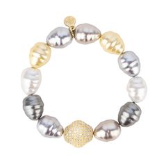 Sublime Baroque pearls in shades of starlight are a must for a statement-making wristscape™.  The beautiful, irregular shape and delicate shading of our Baroque pearls allow you to mix the Isabel bracelet with any of our gorgeous metallic shades of Etoile, Classic Gold, Silver, or Champagne AWB®. A gold drop-shaped accent bead is studded with tiny clear crystals giving Isabel an even more glamorous look. One size fits most. Handcrafted in the US.  Mindful Glamour Ritual:  Pause. Breathe. Slip on your Isabel Baroque pearl bracelet while thinking that a pearl, a thing of such refined beauty was caused by an irritant. Focus on how your struggles have caused your growth and uniqueness.  Thought: “Next to sound judgment, diamonds and pearls are the rarest things in the world.” Jean de la Bruyer Diamonds And Pearls, Star Jewelry, Unique Bracelets, Clear Crystals, Classic Gold, Baroque Pearls, Ring Bracelet, Pearl Bracelet, Clear Crystal