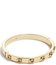 COACH Signature C Hinged Bangle Bracelet | Dillard's Coach Bangle Bracelet, Coach Adjustable Bangle, Adjustable Coach Bangle, Coach Classic Bangle Jewelry, Classic Coach Bangle Jewelry, Coach Classic Bangle, Coach Gold Bangle Bracelet, Coach Metal Bangle Jewelry, Coach Metal Bracelet Jewelry