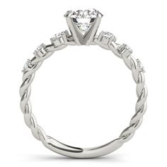 a white gold engagement ring with diamonds on it