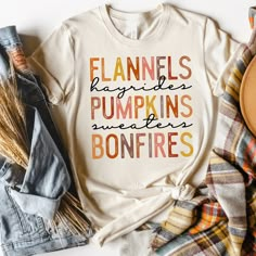 "Flannels Hayrides Sweaters Pumpkins Bonfires Womens Fall Shirt, Halloween Shirt, Pumpkin Shirt, Pumpkin Patch Shirt, Thanksgiving Shirt *Made to Order* All of our shirts are made to order with the sizes, colors and image specifications selected at the time your order is placed, and printed right here in the Dallas, Texas area, USA! Unless otherwise specified, our graphic tees are printed (not vinyl). We use a state of the art Direct to Garment printer which uses Eco-friendly water-based inks, s Sweater Pumpkins, Fall Shirts Women, Cricut Shirts, Patches Shirt, Diy Shirts, Cute Shirt Designs, Fall Tee, Thanksgiving Shirt, Pumpkin Shirt