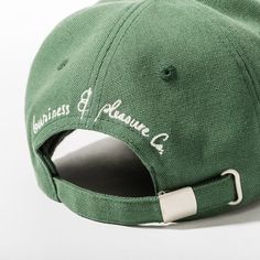 Our Cinque Caps are a nod to the classic dad hat, with that signature B&PCo. flare. Classic styling made with 100% Cotton premium canvas. Featuring an embroidered cinque wheel logo on the front and our script text embroidery on the back. Umbrella Chair, Pillow Stack, Pillow Lounger, Commercial Umbrellas, Text Embroidery, Wheel Logo, Cooler Tote Bag, Umbrella Shop, Script Text