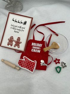 an assortment of holiday baking items including cookie cutters, cookies and other christmas decorations