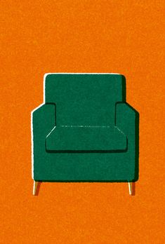 a green chair sitting on top of an orange floor