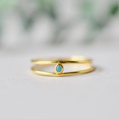 DESCRIPTION: >A slim open ring with faceted turquoise at the center. >Gold plated 925 Sterling Silver fully hallmarked. >Sterling silver is an almost pure metal made from 92.5% Silver. >Approx 4.5mm in length; 2mm turquoise; double band at 1mm each. FREE SHIPPING USA- All of our jewelry will arrive in custom packaging ready for gift giving. CARE: To prolong the color and shine of your jewelry, avoid contact with perfume, lotion, and water. Store in a bag or jewelry box. SATISFACTION Open Turquoise Ring For Promise, Minimalist Turquoise Open Ring For Promise, Gold Minimalist Turquoise Promise Ring, Minimalist Adjustable Turquoise Ring For Anniversary, Minimalist Gold Turquoise Promise Ring, Adjustable Minimalist Turquoise Open Ring, Dainty Adjustable Open Turquoise Ring, Dainty Turquoise Open Ring For Promise, Oval Morganite Ring