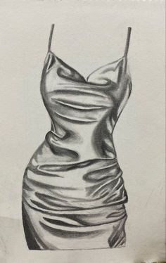 a pencil drawing of a dress on a piece of paper