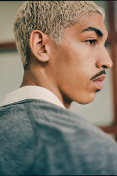 Man wearing Knitted Polo Blonde Hair Moustache Messy Fringe, Gentlemens Guide, Fade Cut, Knit Polo, Buzz Cut, Popular Hairstyles, Fine Knit, Smooth Texture, Men's Style