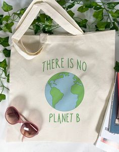 "There is No Planet B Tote Bag, Green Bag, Save The Planet, Cotton Tote Bag, Reusable Market Bag. Tote Bag 6 oz., 100% cotton canvas Folds flat 22\" Self-fabric handles 14 1/2\" W x 15 1/2\" D Each bag is custom printed to order." Tote Bag Straps, Organic Bag, There Is No Planet B, No Planet B, Eco Friendly Bags, Best Mens Fashion, Eco Friendly Clothing, Bag Green, Cotton Tote Bag