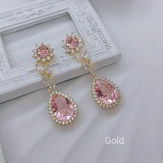 Available in Rose Gold, Gold, and White Gold(silver tone) color.  Whole set:https://www.etsy.com/listing/809424238/light-pink-crystal-bridal-jewelry-set?ref=listings_manager_grid Material: Swarovski  light rose ignite crystals(non-foil-back),  clear cubic zirconia paved findings, plated brass findings, sterling silver ear posts.  Styles: picered earrings or clip-on earrings. Size: Full length approx 4.2cm, 1.4cm wide.  Teardrop dangles are 1.6cm*1.4cm. Gold Pink Earrings, Rose Gold Quinceanera Jewelry, Rose Gold Things, Pink Gold Earrings, Pink Wedding Jewelry, Gold And Pink Earrings, Pink Prom Jewelry, Pink Prom Accessories, Cute Pink Earrings For Wedding