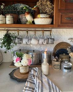 a kitchen counter with pots and pans on it