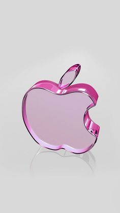 an apple shaped object is shown in pink