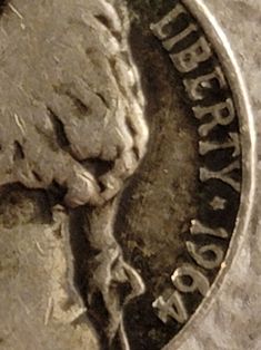 a close up of a coin with the word happy birthday on it