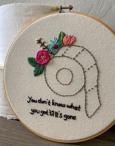 a hand embroidered hoop with a horse's head and flowers on it that says, you don't know what you got it's gone