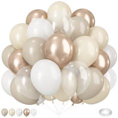 a bunch of white and gold balloons