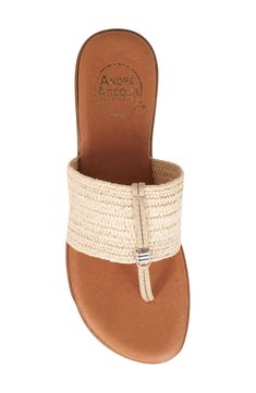 A wide woven band arcs across the padded footbed of this lightweight thong-post sandal that offers grab-and-go comfort with a dash of charm. Flat sole Lightweight: puts cushioning and performance underfoot with an emphasis on streamlined comfort Cushioned footbed Textile and leather upper/leather lining/rubber sole Made in Spain Beach T-strap Sandals In Woven Leather, Adjustable Woven Leather Sandals For Beach, Cushioned Synthetic T-strap Sandals For Vacation, Cushioned T-strap Sandals For Beach, Beach T-strap Sandals With Woven Leather And Round Toe, Cushioned T-strap Flip Flops For Beach, Cushioned T-strap Flip Flops For Vacation, T-strap Sandals With Cushioned Footbed For Beach, Adjustable T-strap Sandals With Removable Insole For Vacation