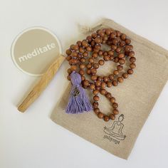 Spiritual Brown Mala For Healing, Spiritual Brown Mala For Meditation, Holistic Mala With 108 Beads For Meditation, Brown Spiritual Mala For Meditation, Holistic Wooden Beads Mala For Rituals, Holistic Beaded Mala For Meditation, Holistic Healing Mala With Wooden Beads, Holistic Wooden Mala For Rituals, Spiritual Wooden Beads Mala For Meditation