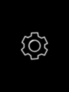 a black background with a white outline of a cogwheel on it's left side