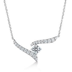 Elevate your everyday wardrobe with the Vela Crossover Pendant. The French cut Pavé setting style uses minimal metal so that your eye focuses on one thing – the beautiful diamonds adorning your neck! This necklace features approximately .41 carat total weight of diamonds, is made of 18K White Gold, and has an 18" adjustable chain. Modern Diamond Necklace With Diamond Cut, Modern Diamond White Round Cut Diamond Necklace, Modern Round Cut Diamond White Necklace, Modern Diamond White Necklace With Brilliant Cut, Modern Cubic Zirconia Diamond Cut Necklace, Fine Jewelry Diamond Necklace With Tension Setting, Diamond Jewelry In Diamond White With Tension Setting, Diamond White Necklace With Tension Setting, Diamond White Diamond Necklace With Tension Setting