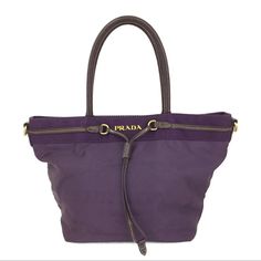 Prada Purple Nylon Tote Bag Euc The Inside Is The Normal Black Signature Prada Lining. This Is A Stunning Piece! No Call Outs. All Sales Are Final So Please Bid Responsibly! Purple Prada Handbag, Bags Prada, Nylon Tote Bag, Nylon Tote Bags, Prada Bags, Nylon Tote, Prada Bag, Leather Trims, Prada