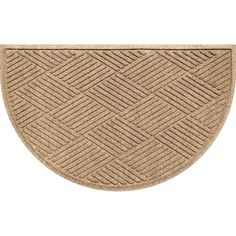 a beige door mat with an oval design on the bottom and sides, in front of a white background