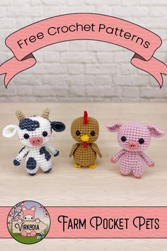 three small crocheted farm animals sitting next to each other