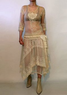 Vintage Fitted Beige Lace, Fitted Vintage Dress With Crochet Lace, Vintage Fitted Dress With Crochet Lace, Cream Lace Dress With Crochet Trim, Vintage Lace Festival Dresses, Fitted Lace Dress With Crochet Trim, Fitted Bohemian Lace Dress With Scalloped Lace, Cream Bohemian Fitted Lace, 1920s Fitted Lace Dress