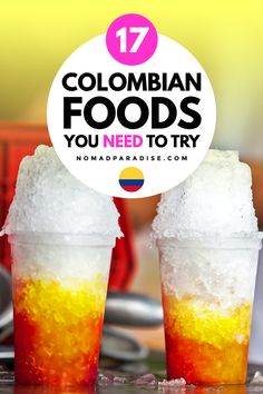 two cups filled with ice sitting next to each other on top of a table and the words colombia foods you need to try