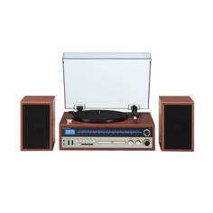 an old fashioned record player and speakers on a white background