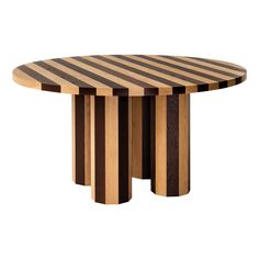 a round wooden table with three vertical stripes on it