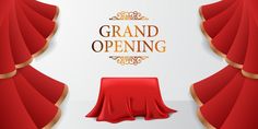 a grand opening with red drapes and table cloth