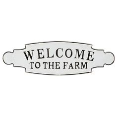 a sign that says welcome to the farm