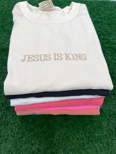 God is Good & Jesus is King Crewneck T-shirts! Super adorable Faith Based Crewnecks! Choose one or both! You can customize the sweatshirt color and thread colors!  **THIS LISTING IS FOR ONE TSHIRT** WE HAVE ADDED A HOODIE VERSION OF THIS DESIGN! YOU CAN PURCHASE IT HERE: https://www.etsy.com/listing/1245462350/jesus-is-king-sweatshirt-embroidered?click_key=31aecfc819c457e092ef47ee6a57059bdcbae968%3A1245462350&click_sum=79638f22&ref=shop_home_active_1&pro=1&frs=1 The Jesus is King TSHIRT pictured White Tops With Letter Embroidery For Spring, White Embroidered Crew Neck Top, Graphic Tee With Letter Embroidery And Short Sleeves, White Cotton Tops With Letter Embroidery, White Crew Neck Top With Embroidered Graphics, Pink Cotton Top With Letter Embroidery, White Letter Embroidery T-shirt For Spring, White T-shirt With Letter Embroidery For Spring, Pink Crew Neck Top With Letter Embroidery