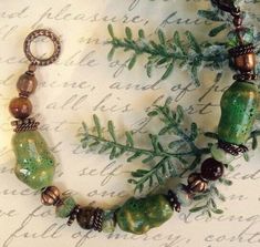 * This modern boho Bracelet goes with so many looks...the forest colors meld beautifully with almost any color palate! Capturing the outdoor shades are Picasso Beads, handmade Ceramic Beads, Copper Spacer Beads, and an Antique Copper Clasp. * Luscious, soft colorations of Mossy Green, Copper, Antique Copper, and Brown create a perfect marriage of Nature's colors. * The Bracelet is very comfortable to wear, and is available in several different lengths; please select your favorite length. * This Desert Shade, Forest Colors, Purple Beaded Bracelets, Forest Color, Mossy Green, Bead Projects, Beaded Boxes, Multi Strand Bracelet, Color Palate