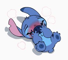 a blue and pink cartoon character laying on its back with it's eyes closed