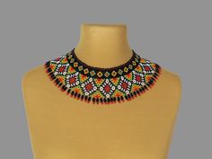 "It is a dainty bead necklace pairs well with casual wear or evening dresses. Modern beaded jewelry will decorate any look. If you want your jewelry to last as long as possible, avoid water and dust. This necklace is crafted with Czech beads and durable nylon threads. The total length of the necklace is 43cm (16.93\"), the width is 7.5cm (2.75\"). The length of the necklace is not adjustable. Important Information: -Please make sure your address is entered correctly. -Taxes, duties and charges a Bohemian Bib Necklace With Black Beads For Gifts, Bohemian Bib Necklace With Black Beads As Gift, Bohemian Black Beads Bib Necklace As Gift, Bohemian Black Beaded Bib Necklaces As Gift, Bohemian Black Beaded Bib Necklace As Gift, Black Beaded Bib Necklace, Gift Colorful Beads Bib Necklace, Gift Bib Necklaces With Colorful Round Beads, Gift Bib Necklace With Colorful Round Beads