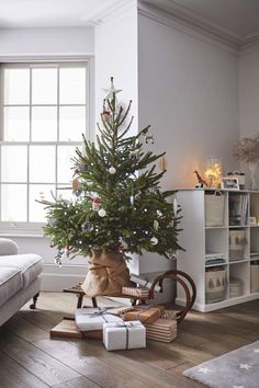 a small christmas tree in a living room