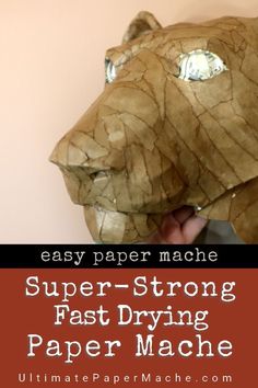 the paper mache is being made to look like a tiger's head, with text overlay that reads easy paper mache super - strong fast drying paper mache