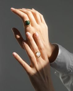 Enviable with its handmade craft the Neon ring features repurposed gold for sustainable shine. The green malachite stone highlights your finger with its cabochon cut. This piece is made to order just for you so please allow 3-6 weeks for your item to ship. This item is final sale. 9k gold (ring) 14k gold (setting) and malachite cabochon Gold: repurposed Clean with soft cloth Stone sourced from India Handmade in Antwerpen Belgium | Nayestones Neon Malachite Ring 8 | Gemstones/Yellow Gold Luxury Yellow Gold Rings With Natural Stones, Fine Jewelry Pearl Ring With Polished Finish, Fine Jewelry Pearl Ring With Polished Open Ring, Formal Dome Ring With Open Ring Gemstone, Elegant Yellow Gold Rings With Natural Stones, Elegant Yellow Gold Ring With Natural Stones, Modern Round Gemstone Rings, Luxury Gemstone Open Ring, Modern Green Round Dome Ring