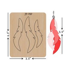 two wooden earrings with red and white designs on them, one is shaped like a fox