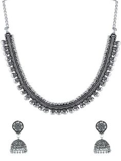 This jewellery set consists of a necklace and a pair of earrings Oxidized silver-plated necklace, has Kolhapuri work, has a chain secured with S-hook closure Comes with a matching pair of jhumka earrings, secured with a push and back closure Size & Fit Dimensions Of Necklace: 46.5 cm x 1.5 cm (Length x Width) Dimensions Of Earrings: 4.5 cm x 1.5 cm (Length x Width) Each Material & Care Material: German Silver Plating: Silver-Plated Care Instructions: Wipe your jewellery with a soft cloth after every use Always store your jewellery in a flat box to avoid accidental scratches Keep sprays and perfumes away from your jewellery Do not soak your jewellery in water Clean your jewellery using a soft brush, dipped in jewellery cleaning solution only Dispatch within 7 days Festival Metal Necklace With Matching Earrings, Festival Metal Necklaces With Matching Earrings, Traditional Silver Dangle Jewelry Sets, Silver Dangle Temple Jewelry Necklace, Silver Dangle Jewelry Sets For Festivals, Elegant Silver Jewelry Sets With Latkans, Silver Necklaces With Matching Earrings For Festive Occasions, Silver Necklace With Matching Earrings For Festive Occasions, Festive Silver Necklaces With Matching Earrings