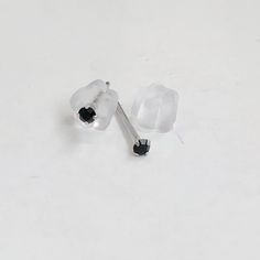 1mm is back in stock, Limited quantity Tiny Black Stud Earrings (PAIR) Features: Size: 1mm(1.5mm), 1.8mm, 2mm and 3mm Post: 20g / 0.8mm Material: Black CZ and 92.5 Sterling Silver Earrings are coming with Butterfly metal backs *THIS ITEMS ARE NOT REFUNDABLE OR EXCHANGEABLE DUE TO HYGIENE REASONS* Black Minimalist Sterling Silver Cartilage Earrings, Small Black Earrings Studs, Black Diamonds Stud Earrings, Black Crystal Earrings Studs, Stud Earrings Black, Minimalist Stud Earrings, Earring Hole, Black Stud Earrings, Minimalist Earrings Studs