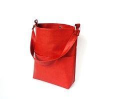 Red hobo bag faux leather handmade.  Height - 32 cm  (12,59 ") Top width from seam to seam - 33 cm  (12,99 ") Bottom width - 23 cm ( 9,06 " ) Depth - 10 cm   (3,93 ") Handle - 56 cm  (22,04 ") Red orange brick color hobo bag is made of faux leather. Red orange bag has a cotton lining, 1 large pocket outside, 2 pockets inside. Hobo bag is very beautiful and stylish. Dark orange (red brick) color is very popular. Fashion red shoulder bag for women fastens with magnetic button. Women's red orange h Red Shoulder Bag, Orange Brick, Brick Colors, Red Handbag, Popular Fashion, Dark Orange, Orange Bag, Red Bricks, Hobo Bag