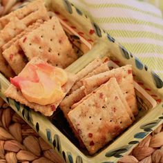 some crackers are sitting in a bowl on a table