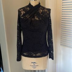 Elie Tahari Lace Top Szs Black Long Sleeves Lined. Draped Neckline. Three Buttons At Back Neckline. 2 Are Missing. 1 Is Attached To Shirt. One Extra Button In Bag. Measurements Are: Pit2pit 19” Waist 15” Hip 18” Length 24” Elegant Stretch Lace Top For Night Out, Elegant Black Lace Top For Date Night, Fitted Black Lace Top For Evening, Black Lace Formal Tops, Fitted Black Lace Top For Formal Occasions, Stretch Lace Top, Black Silk Blouse, Lavender Silk, Draped Neckline